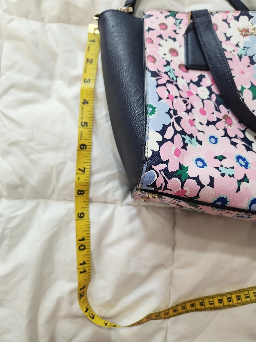Kate Spade Cameron Street Small Hayden Satchel in a floral pattern